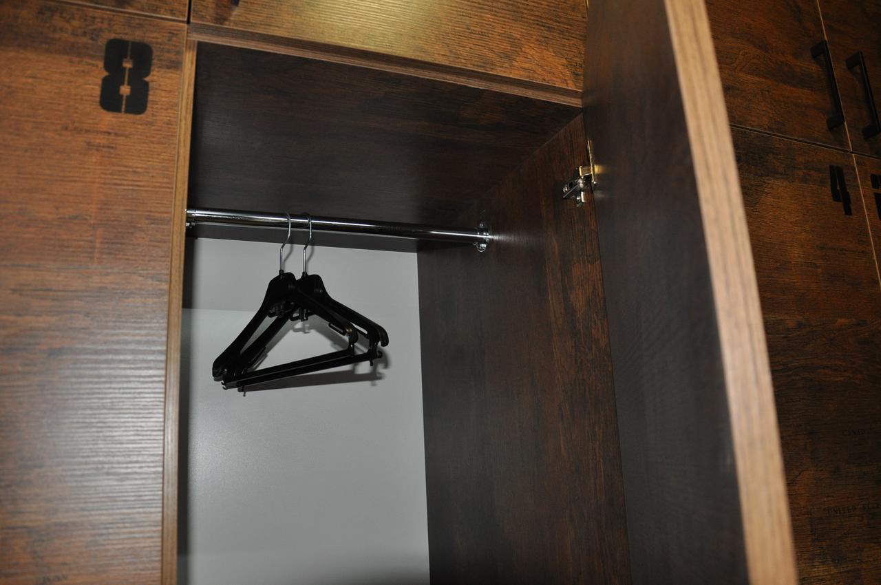Full House Capsule Hostel Ривне Екстериор снимка A coat hanger in a wardrobe