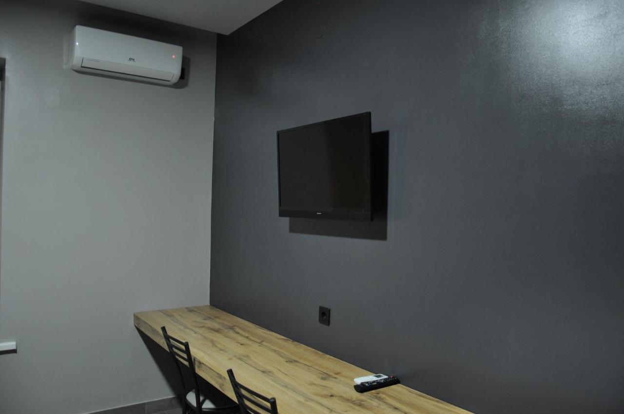 Full House Capsule Hostel Ривне Екстериор снимка A wall-mounted television
